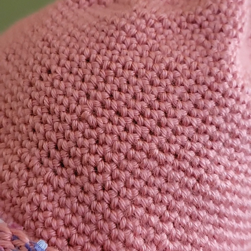 Hand crochet hat with brim.  Womans pink multi-colored eyelash year trim
